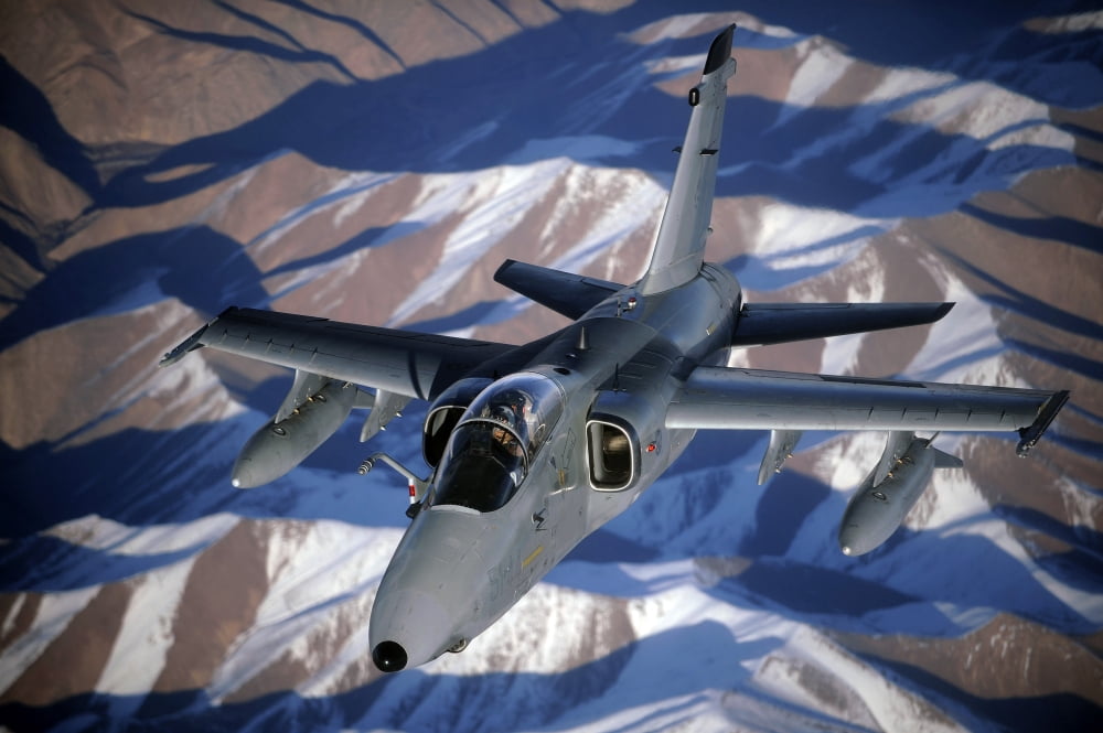 An Italian AMX disconnects from a KC-10A Extender after refueling over Afghanistan Canvas Art - Stocktrek Images (34 x 23)