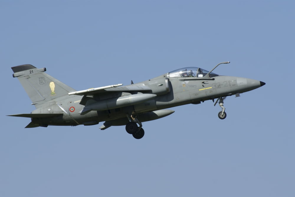 An Italian Air Force AMX aircraft in flight over Florennes Belgium Canvas Art - Ramon Van OpdorpStocktrek Images (35 x 23)