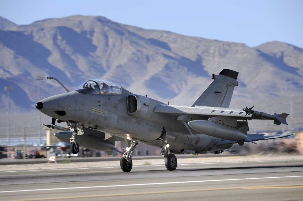 An Italian Air Force AMX fighter landing at Nellis Air Force Base in Nevada Canvas Art - Stocktrek Images (34 x 23)