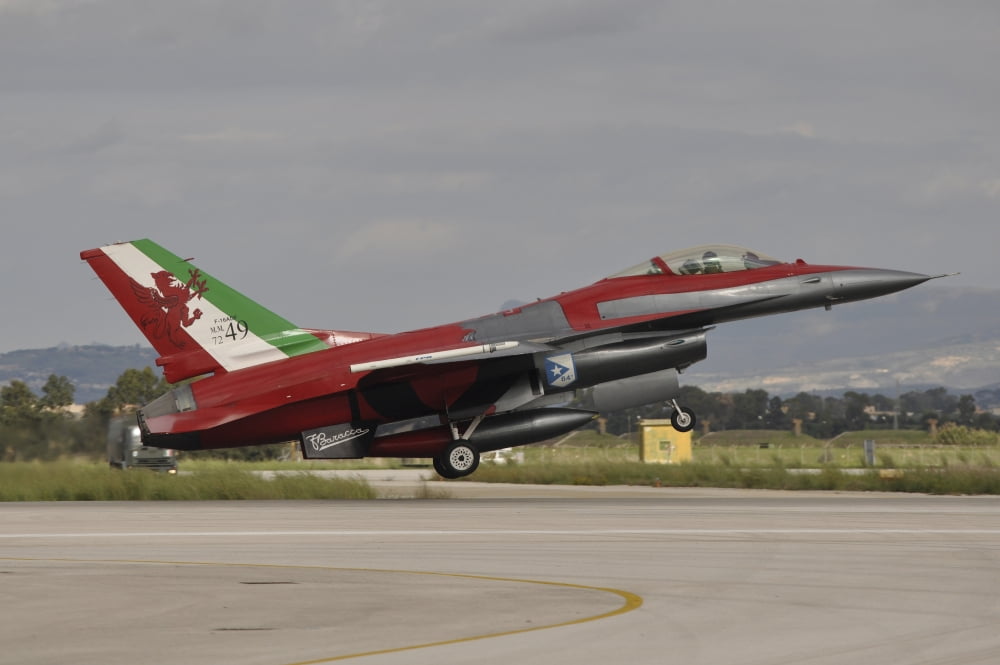 An Italian Air Force F-16 Air Defense Fighter landing at Trapani Airport Italy Canvas Art - Giorgio CiariniStocktrek Images (17 x 12)