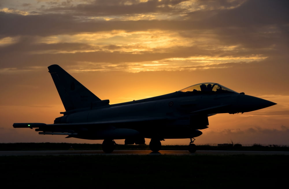 An Italian Air Force F-2000 Typhoon at sunset Canvas Art - Giovanni CollaStocktrek Images (34 x 23)