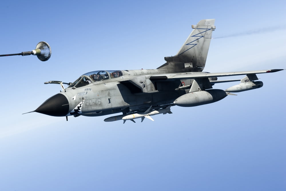 An Italian Air Force Tornado IDS conducts in-flight refueling Canvas Art - Gert KromhoutStocktrek Images (35 x 24)