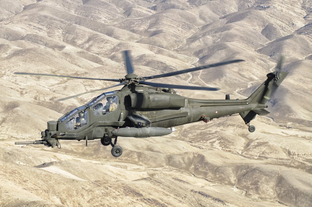 An Italian Army AW-129 Mangusta over Afghanistan Canvas Art - Giovanni CollaStocktrek Images (18 x 12)