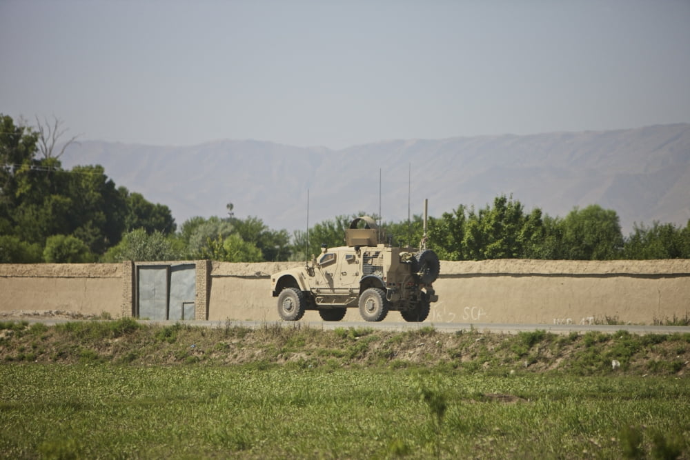 An M-ATV driving towards Aliabad from Kunduz Afghanistan Canvas Art - Terry MooreStocktrek Images (35 x 24)