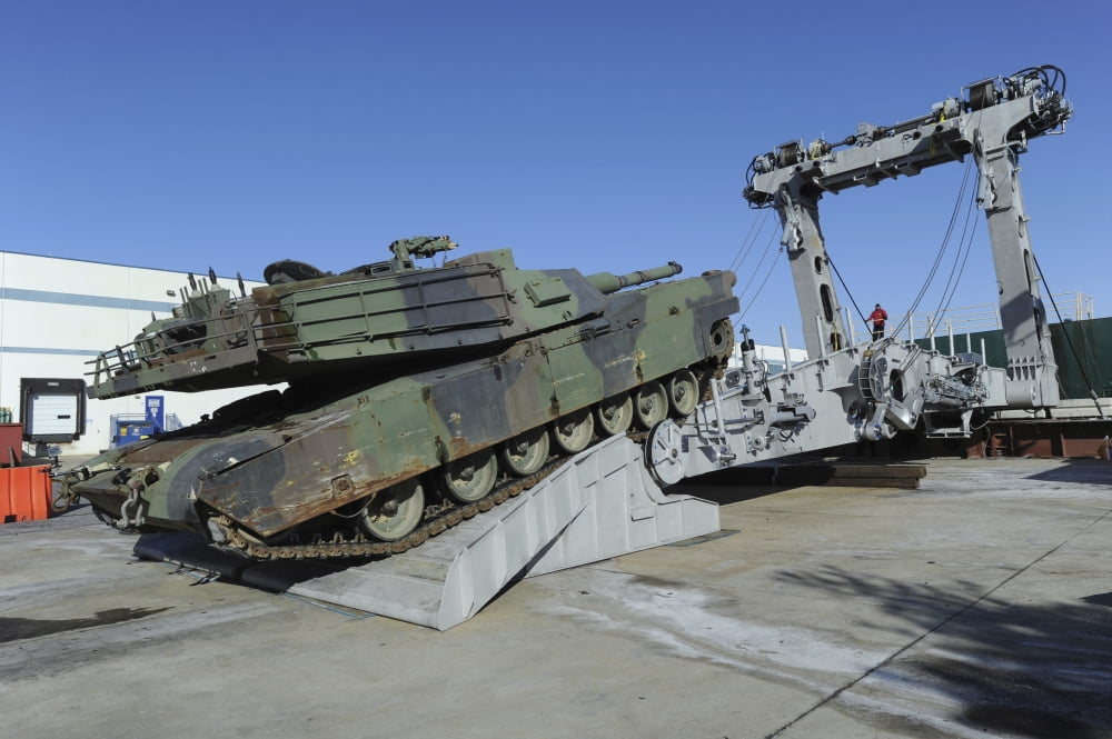 An M1A1 Abrams tank drives over an advanced light-weight ramp Canvas Art - Stocktrek Images (34 x 23)
