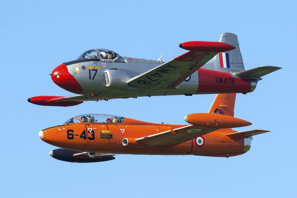 An MB-326E of the Italian Air Force flies alongside a Jet Provost T3A Canvas Art - Daniele FaccioliStocktrek Images (34 x 23)
