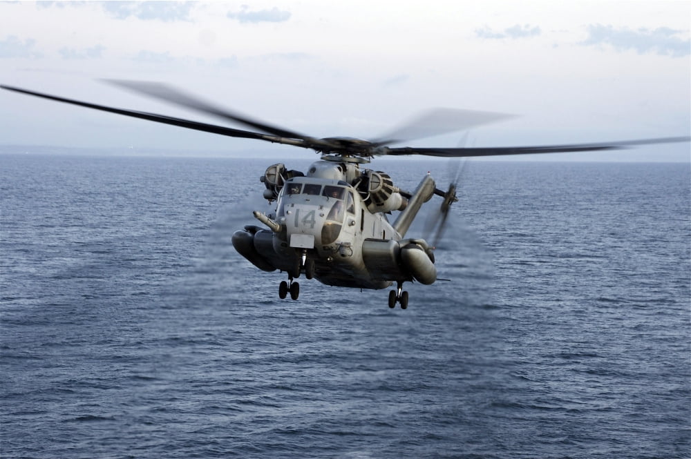 An MH-53E Sea Dragon in flight over the Pacific Ocean Canvas Art - Stocktrek Images (34 x 23)