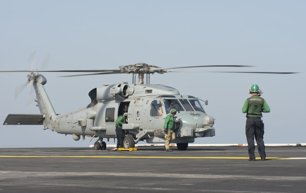 An MH-60R Seahawk embarked aboard USS Theodore Roosevelt Canvas Art - Giovanni CollaStocktrek Images (18 x 11)