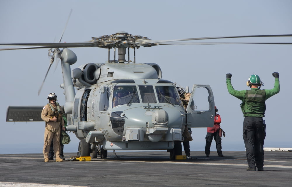An MH-60R Seahawk embarked aboard USS Theodore Roosevelt Canvas Art - Giovanni CollaStocktrek Images (18 x 12)