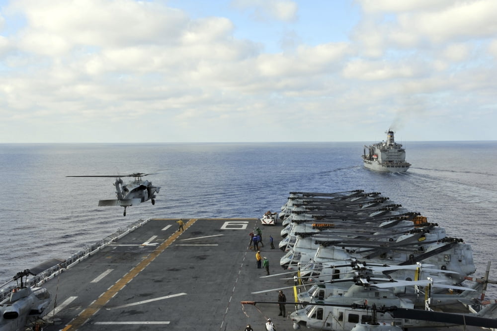 An MH-60S Sea Hawk takes off from the flight deck of USS Bonhomme Richard Canvas Art - Stocktrek Images (35 x 23)