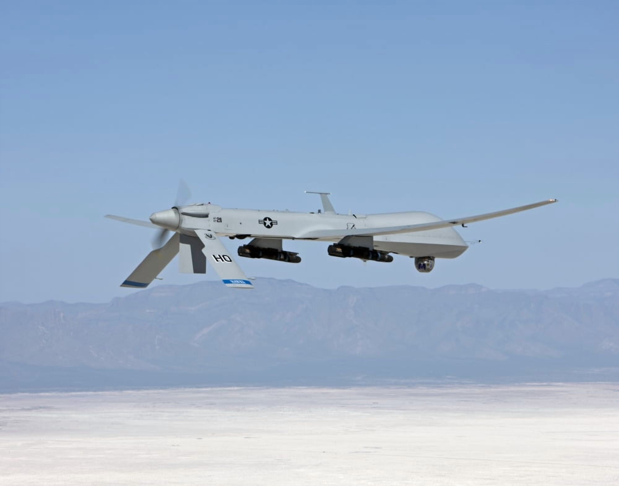 An MQ-1 Predator flies a training mission over New Mexico Canvas Art - HIGH-G ProductionsStocktrek Images (16 x 13)