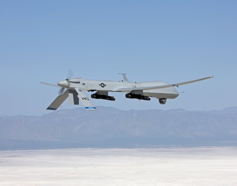 An MQ-1 Predator flies a training mission over New Mexico Canvas Art - HIGH-G ProductionsStocktrek Images (32 x 26)