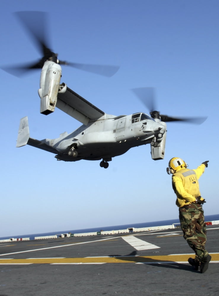 An MV-22 Osprey launches from the USS Nassau Canvas Art - Stocktrek Images (25 x 33)