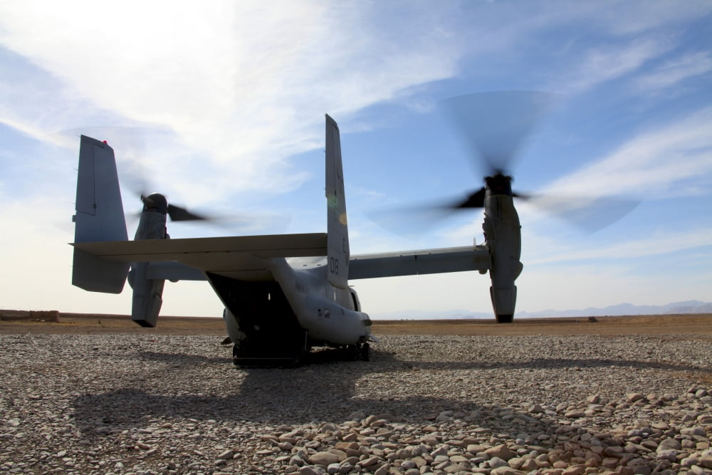 An MV-22 Osprey sits outside a forward operating base in Afghanistan Canvas Art - Stocktrek Images (35 x 23)