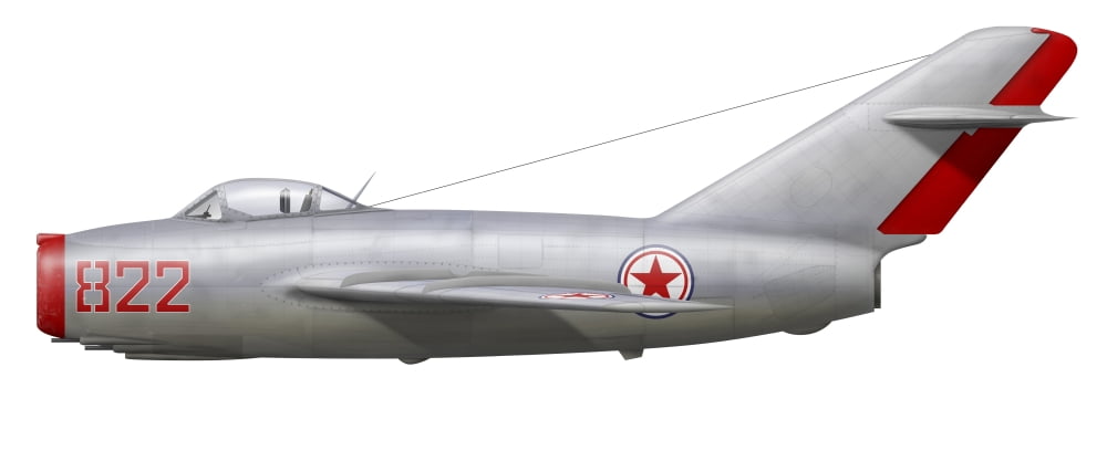 An MiG-15bis of the North Korean Air Force Canvas Art - InkwormStocktrek Images (23 x 9)