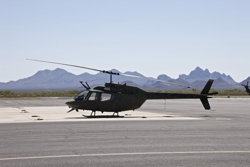 An OH-58 Kiowa helicopter of the US Army Canvas Art - Terry MooreStocktrek Images (35 x 23)