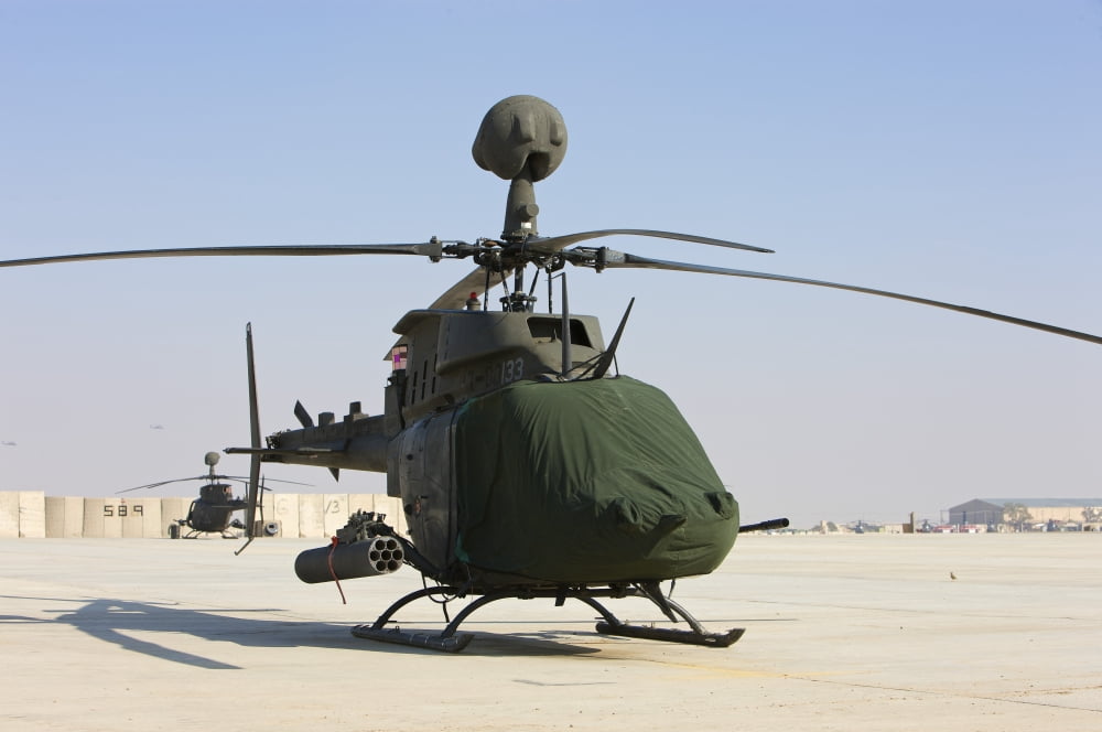 An OH-58D Kiowa Warrior helicopter Canvas Art - Terry MooreStocktrek Images (34 x 23)