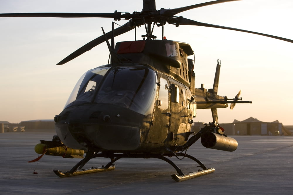 An OH-58D Kiowa during sunset Canvas Art - Terry MooreStocktrek Images (18 x 12)