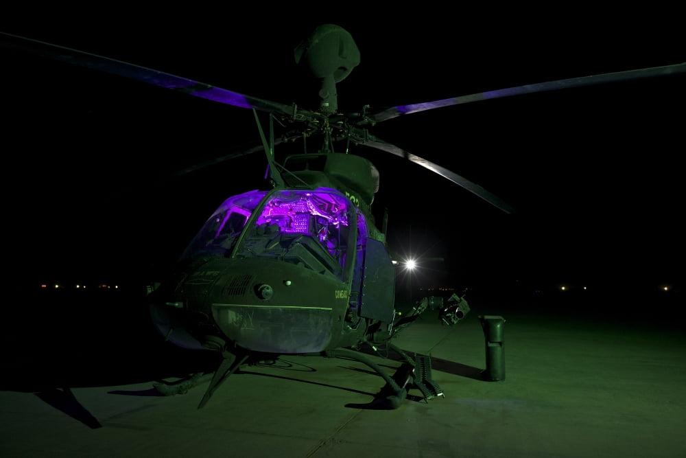 An OH-58D Kiowa helicopter at COB Speicher Tikrit Iraq Canvas Art - Terry MooreStocktrek Images (35 x 23)