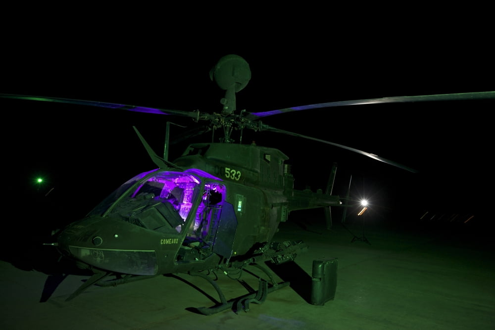 An OH-58D Kiowa helicopter at COB Speicher Tikrit Iraq Canvas Art - Terry MooreStocktrek Images (35 x 23)