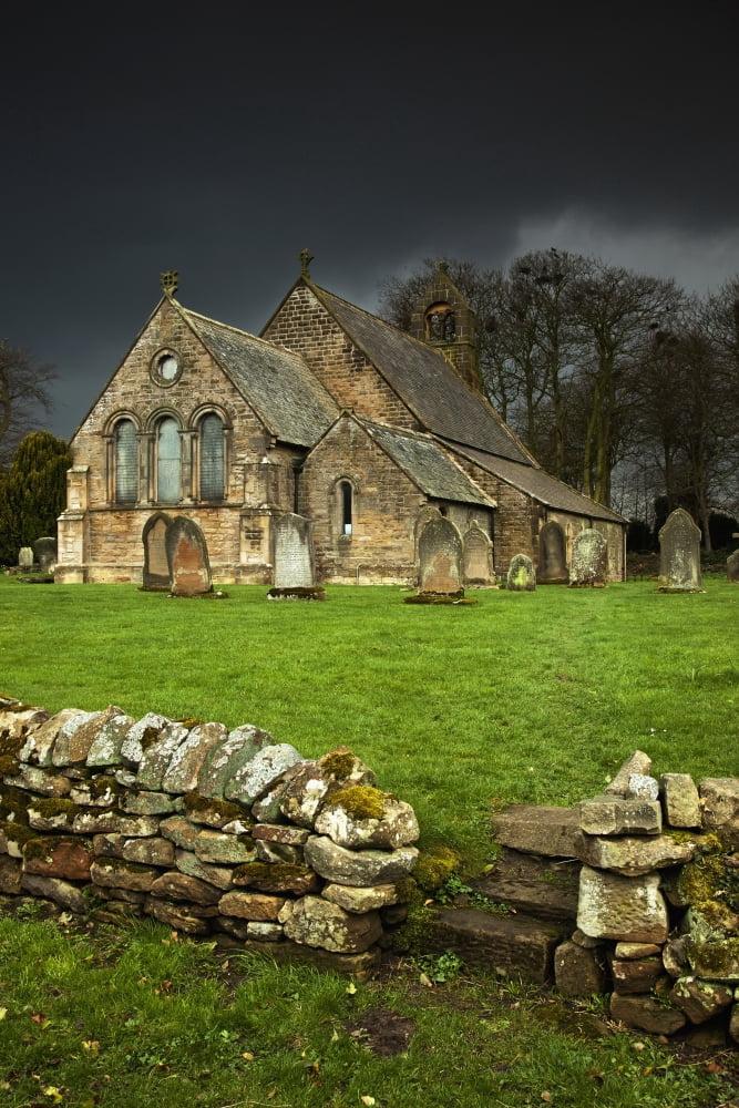 An Old Church Under A Dark Sky Northumberland England Canvas Art - John Short Design Pics (12 x 19)