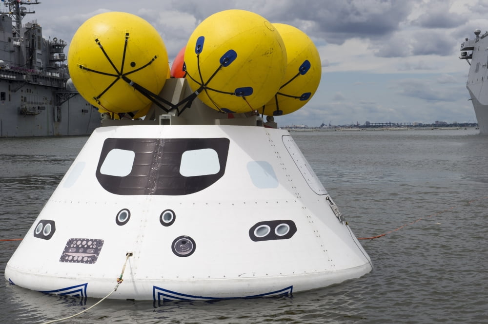 An Orion capsule before being towed into the well deck of USS Arlington Canvas Art - Stocktrek Images (35 x 23)