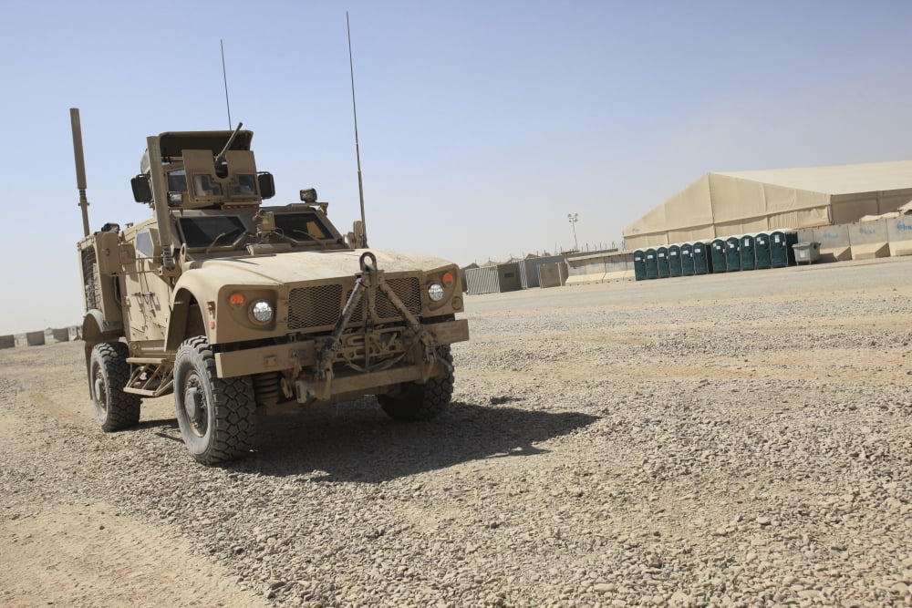 An Oshkosh M-ATV sits parked at Camp Leatherneck Afghanistan Canvas Art - Stocktrek Images (34 x 23)