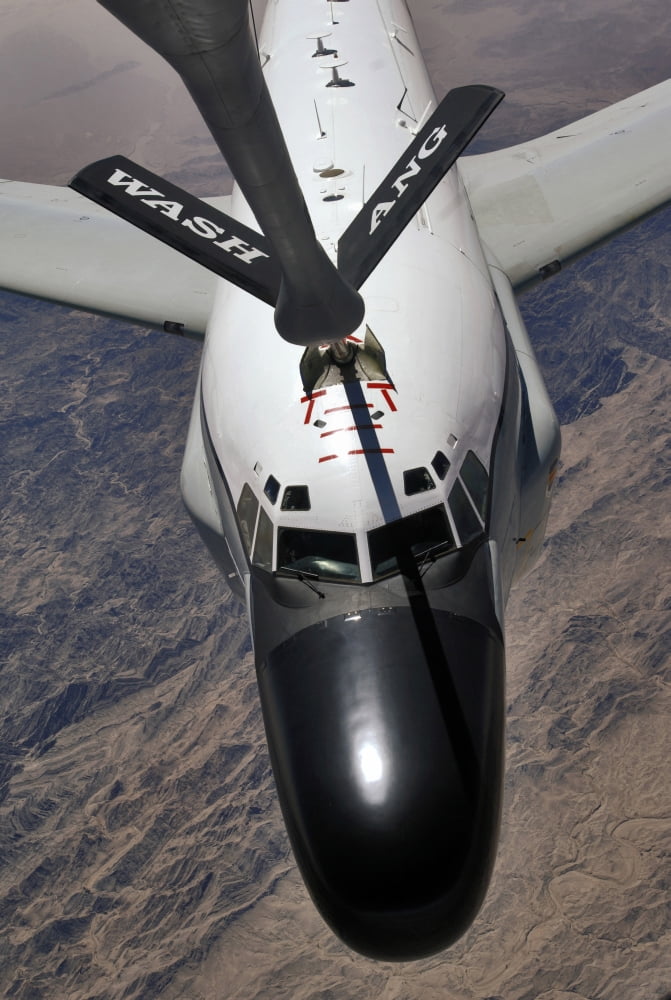 An RC-135 Rivet Joint Reconnaissance aircraft receives fuel from a KC-135 Stratotanker Canvas Art - Stocktrek Images (23 x 34)