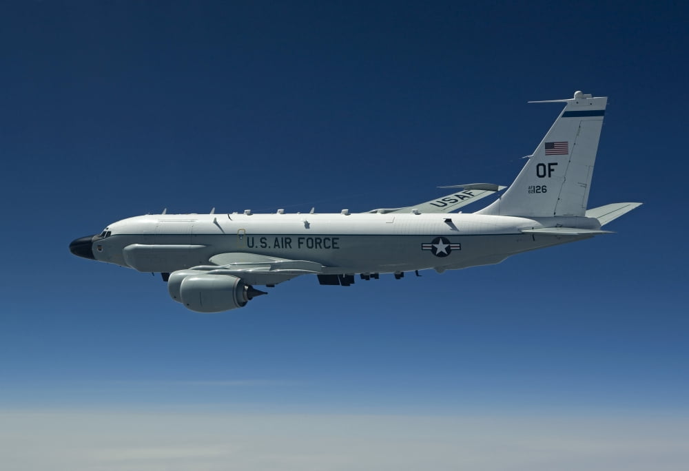 An RC-135W Rivet Joint aircraft flies over the Midwest Canvas Art - HIGH-G ProductionsStocktrek Images (18 x 12)