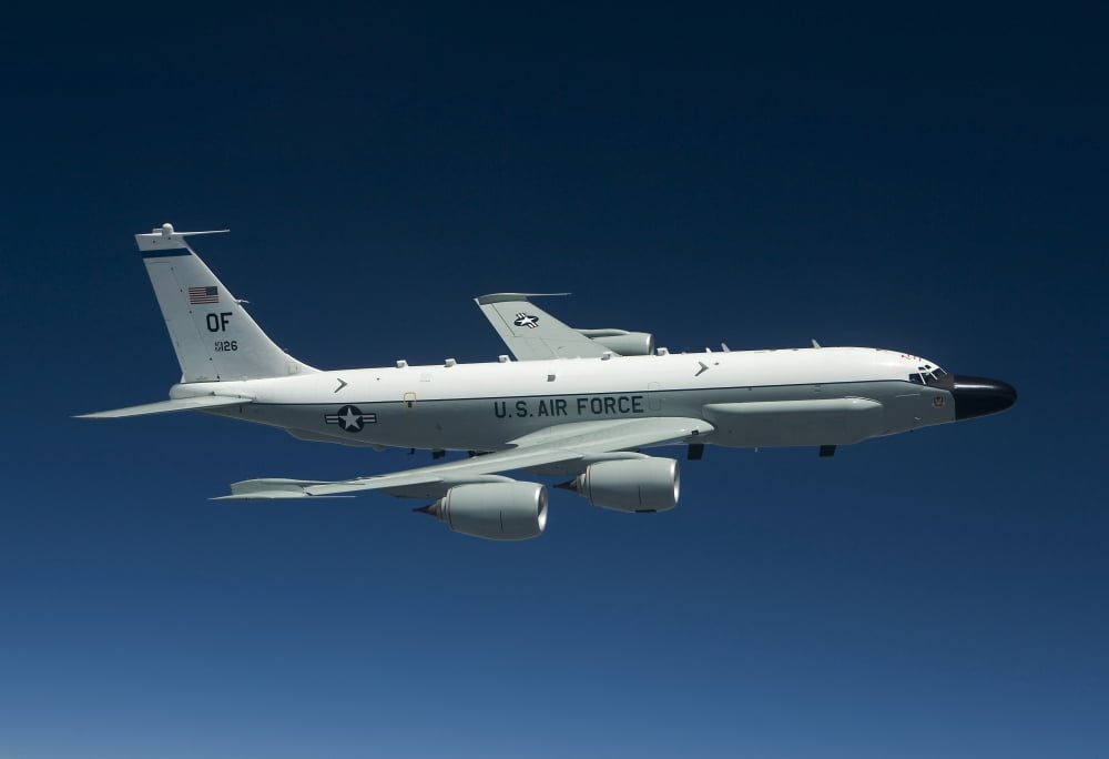 An RC-135W Rivet Joint aircraft flies over the Midwest Canvas Art - HIGH-G ProductionsStocktrek Images (18 x 12)