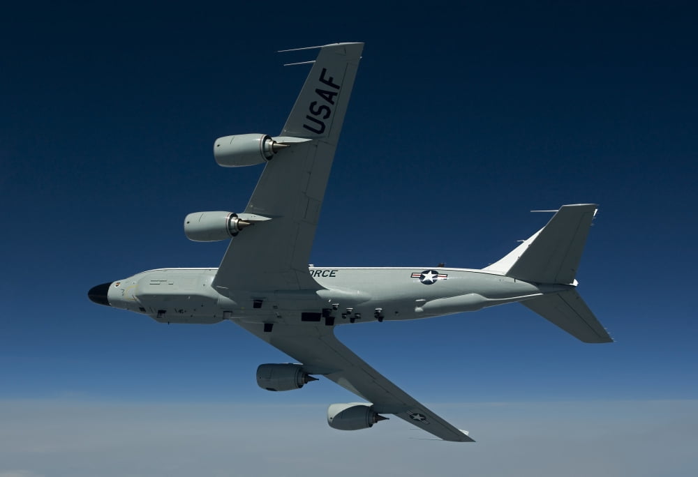 An RC-135W Rivet Joint aircraft flies over the Midwest Canvas Art - HIGH-G ProductionsStocktrek Images (18 x 12)
