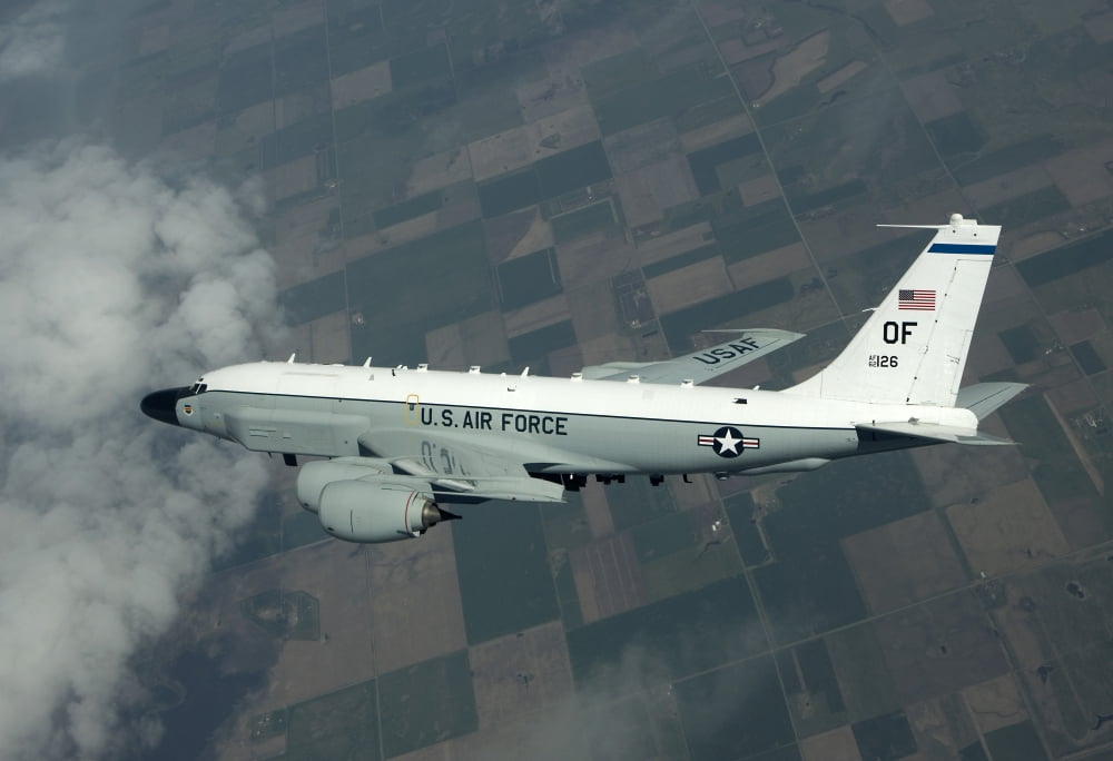 An RC-135W Rivet Joint aircraft flies over the Midwest Canvas Art - HIGH-G ProductionsStocktrek Images (18 x 12)