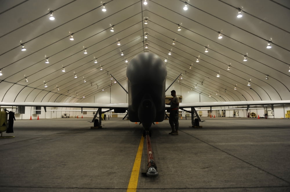 An RQ-4 Global Hawk unmanned aerial vehicle parked in the hangar Canvas Art - Stocktrek Images (35 x 23)