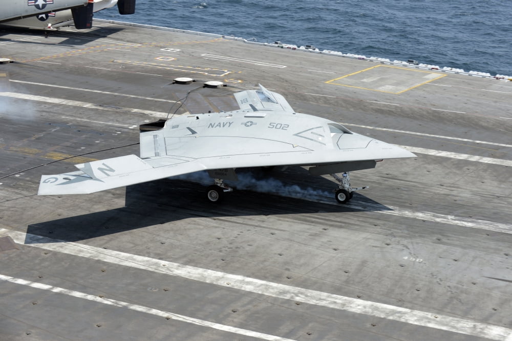 An X-47B Unmanned Combat Air System makes an arrested landing Canvas Art - Stocktrek Images (35 x 23)