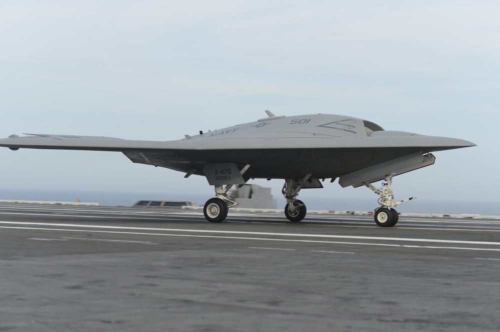 An X-47B unmanned combat air system conducts a touch and go landing Canvas Art - Stocktrek Images (35 x 23)