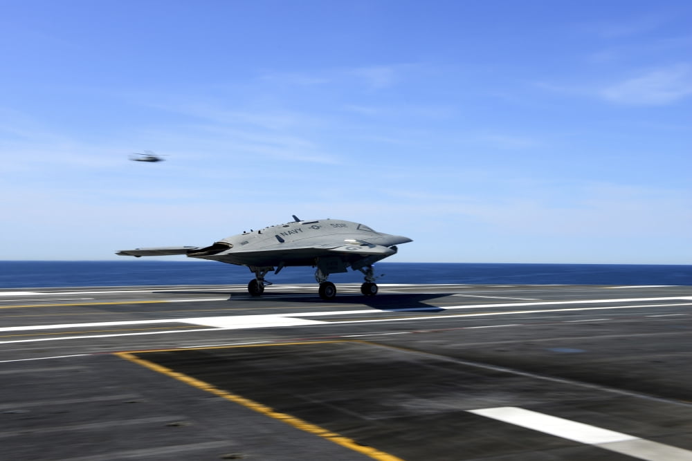 An X-47B unmanned combat air system conducts a touch and go landing Canvas Art - Stocktrek Images (35 x 23)