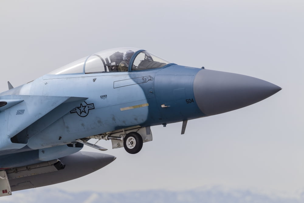 An aggressor F-15C Eagle of the US Air Force Canvas Art - Rob EdgcumbeStocktrek Images (34 x 23)