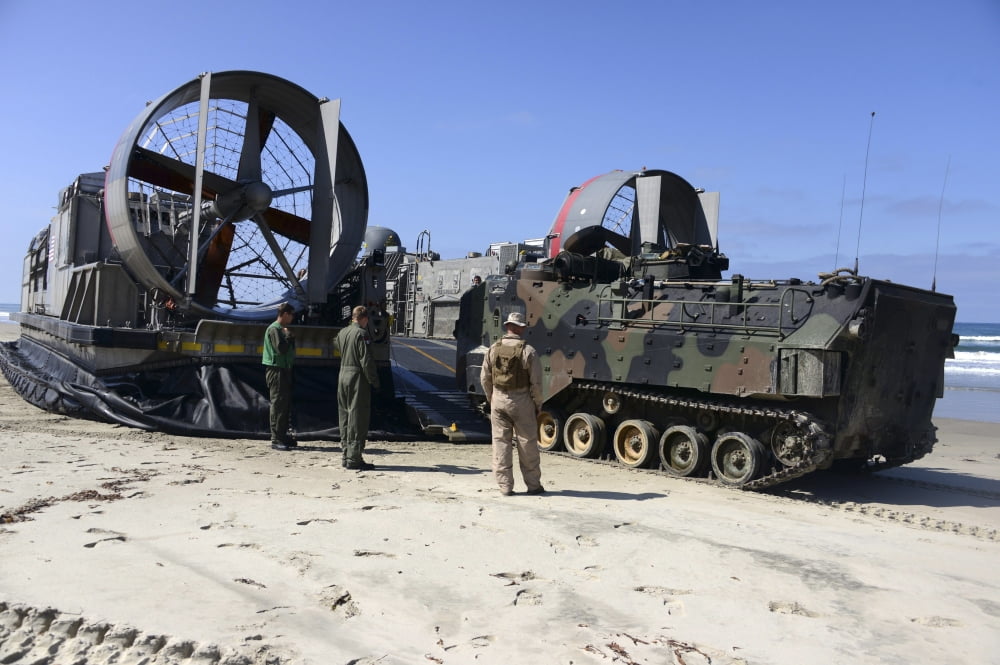 An amphibious assault vehicle embarks a landing craft air cushion for transport Canvas Art - Stocktrek Images (34 x 23)