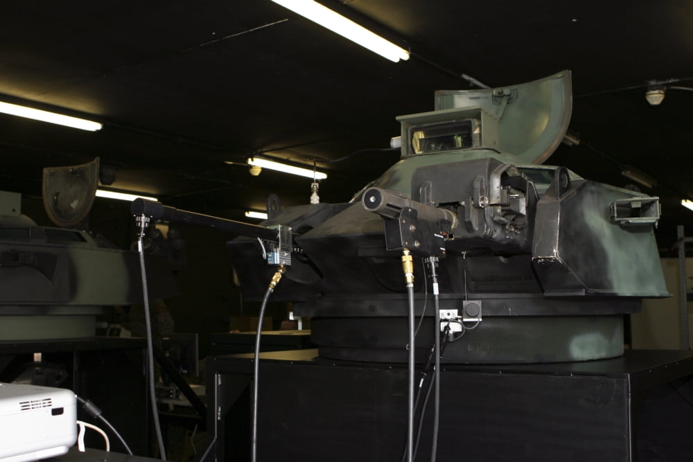 An amphibious assault vehicle turret trainer sits in an old armory building Canvas Art - Stocktrek Images (34 x 23)