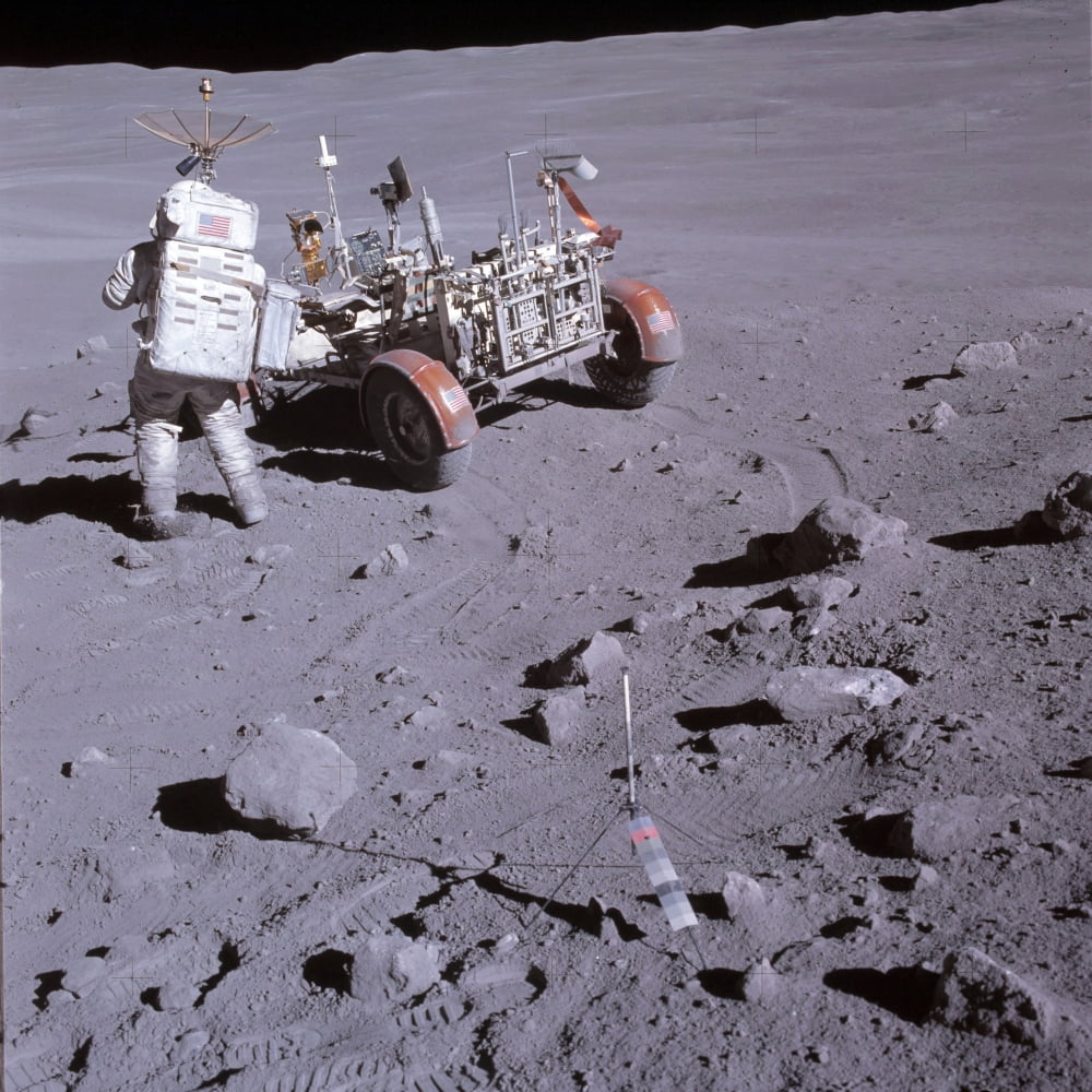 An astronaut and a lunar roving vehicle during an Apollo moonwalk Canvas Art - Stocktrek Images (28 x 28)