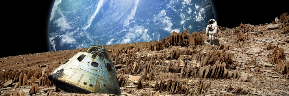 An astronaut surveys his situation on a barren and rocky moon Canvas Art - Marc WardStocktrek Images (48 x 16)