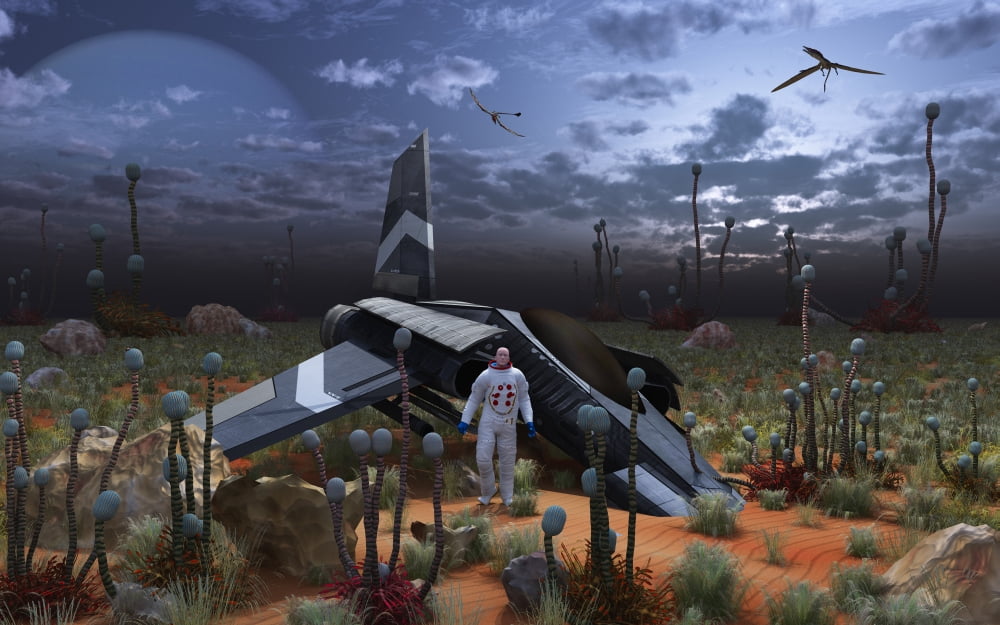 An astronaut surveys the desert like landscape of an alien world Canvas Art - Mark StevensonStocktrek Images (36 x 23)