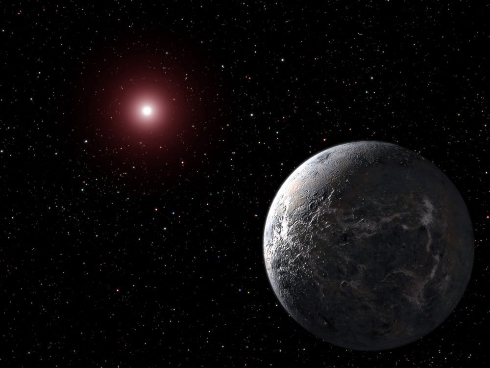 An icyrocky planet orbiting a dim star Canvas Art - Stocktrek Images (32 x 24)