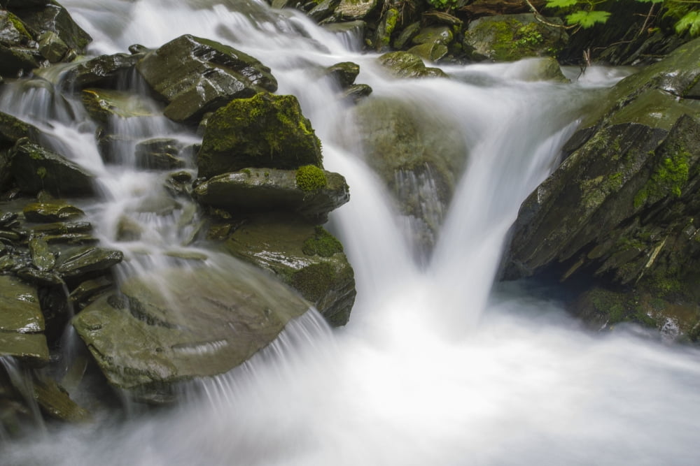 An unnammed creek rushes through a narrow canyon near Valdez Alaska United States of America Canvas Art - Zachary Sheldon Design Pics (19 x 12)