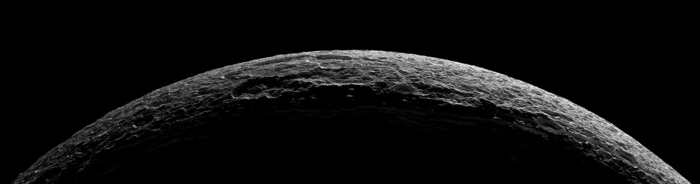 An unreal landscape of Saturns moon Dione blasted by impacts Canvas Art - Stocktrek Images (54 x 15)