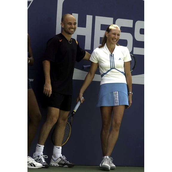 Andre Agassi and Steffi Graf on a tennis court Photo Print (24 x 30)