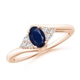 thumbnail image 1 of ANGARA Natural Oval Sapphire Bypass Ring with Trio Diamond Accents in 14K Rose Gold for Women (Size-6x4mm) | September Birthstone, Anniversary, Jewelry Gift for Women | Natural Blue Sapphire Ring, 1 of 8