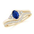 thumbnail image 1 of ANGARA Natural Oval Blue Sapphire Bypass Bridal Set with Diamonds in 14K Yellow Gold for Women (Size-6x4mm) | September Birthstone, Anniversary, Jewelry Gift for Women | Natural Blue Sapphire Ring, 1 of 9