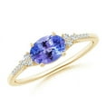 thumbnail image 1 of ANGARA Natural Tanzanite Engagement Ring with Trio Diamond Accents in 14K Yellow Gold for Women (Size-7x5mm) | December Birthstone, Anniversary, Jewelry Gift for Women | Natural Tanzanite Ring, 1 of 9