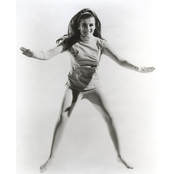 Ann-Margaret jumping in a shirt dress Photo Print (8 x 10)